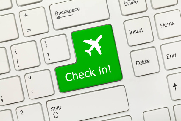 White conceptual keyboard - Check in (green key with airplane sy - Foto, afbeelding