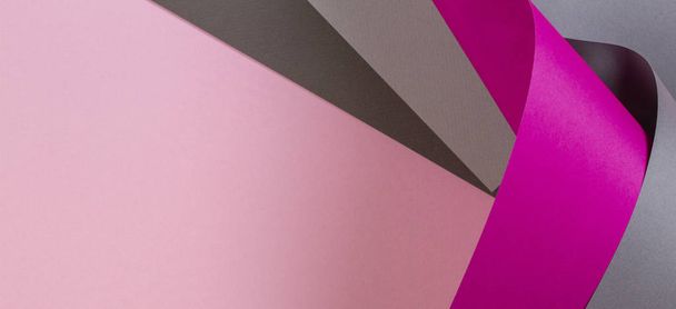 Abstrakti värikäs tausta. Pastelli vaaleanpunainen ja harmaa paperi geometrisessa muodossa
 - Valokuva, kuva