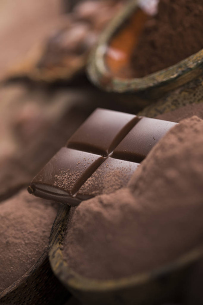 Chocolate bar, candy sweet, cacao beans and powder  - Fotoğraf, Görsel