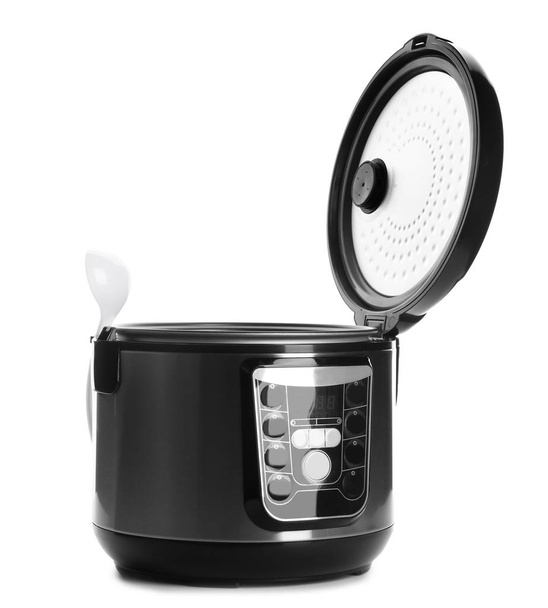 New modern multi cooker with ladle on white background - Foto, immagini