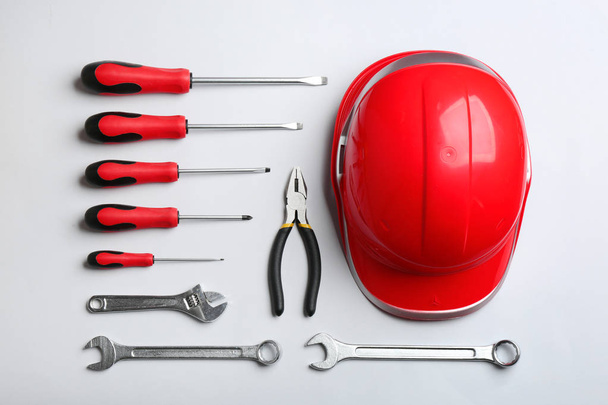 Flat lay composition with different construction tools on white background - Photo, Image