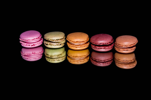 Macaroon homemade isolated on a black background - Foto, Imagen
