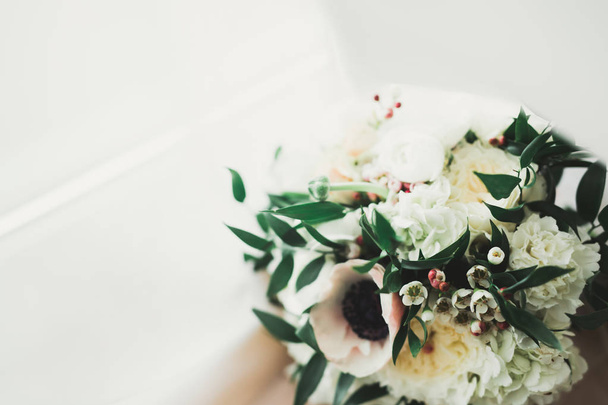 Wonderful luxury wedding bouquet of different flowers - Fotó, kép