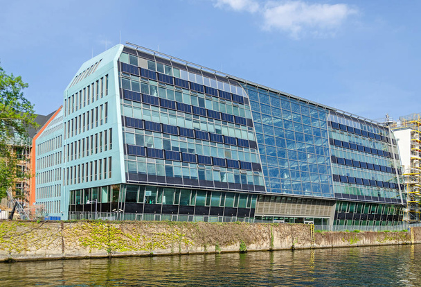 Banks of the River Spree with the building of Valentin Software in Berlin - Fotoğraf, Görsel