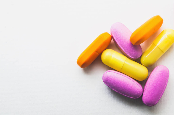medicine assorted pills capsules for women isolated on white background - Valokuva, kuva