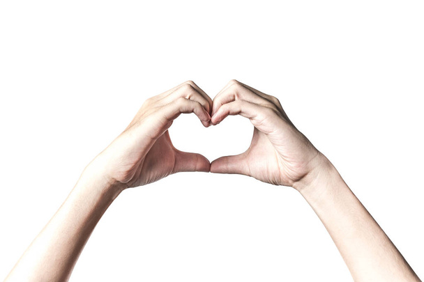 Handen in de vorm van hart geïsoleerd op een witte achtergrond met uitknippad. Handen in de vorm van liefde hart. Valentine dag concept. - Foto, afbeelding