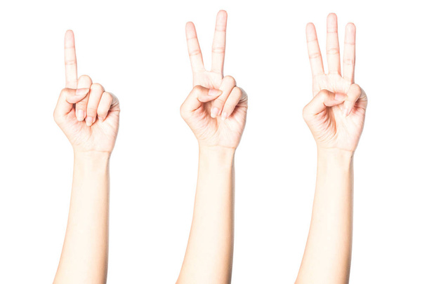 Handen tonen de nummer één twee drie geïsoleerd op een witte achtergrond met uitknippad. - Foto, afbeelding