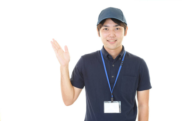Sorrindo trabalhador asiático isolado no fundo branco
 - Foto, Imagem