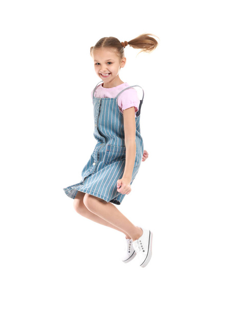Vicces jumping lány fehér háttér - Fotó, kép