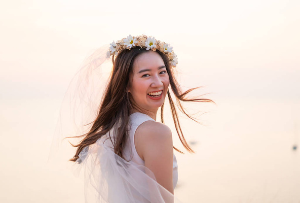 Happy young Asian woman with bride veil - Zdjęcie, obraz