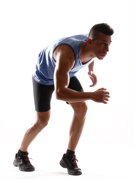 Healthy and fitness man running on white background. - 写真・画像