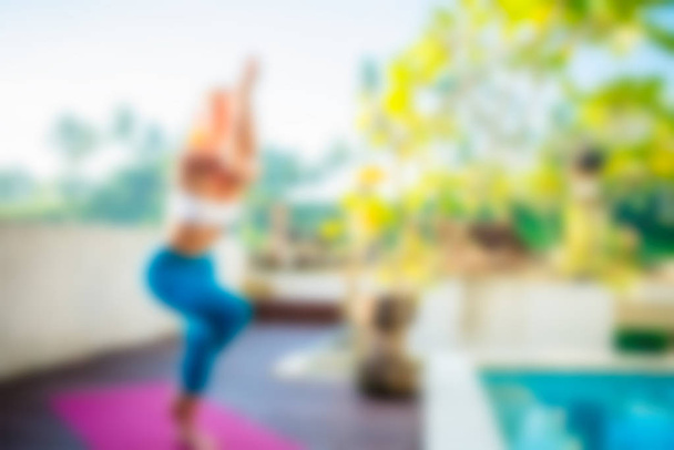 Yoga at Bali Indonesia Travel theme blur background - Fotó, kép