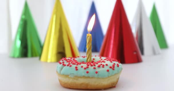 One candle with fire in a donut - Footage, Video