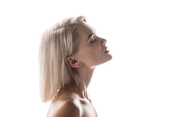 profile of attractive, nude confident woman with closed eyes isolated on grey - Фото, изображение