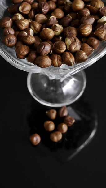 Hazelnuts in a glass bowl  - Foto, Imagem