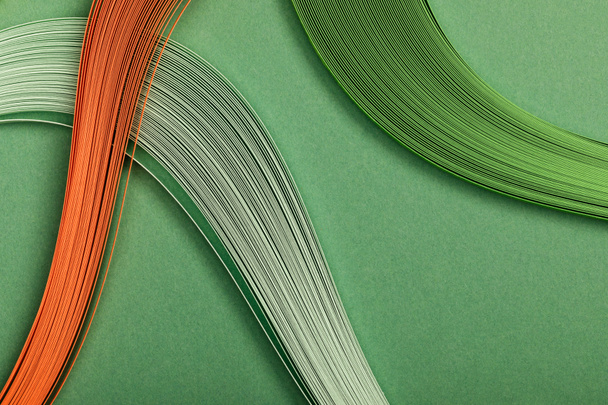 close up of colorful abstract lines on green background - Photo, Image