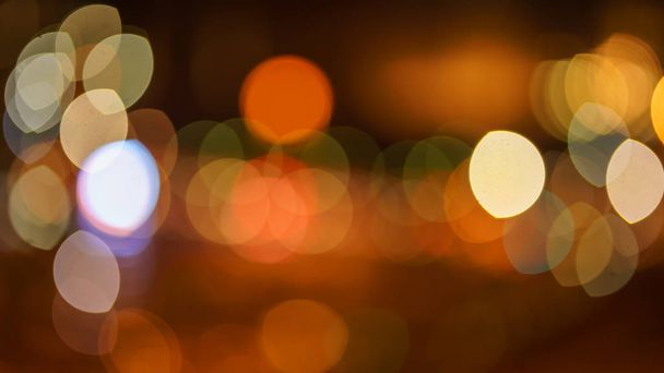 Abstract blurred blue, orange and yellow bokeh lights background - Photo, Image