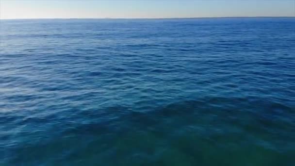 Aerial drone footage over the water on the Spanish coastal - Materiaali, video