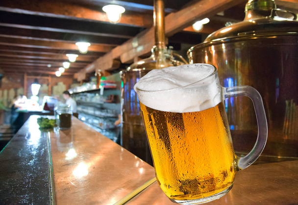 Glass of beer in the brewery. - Photo, Image