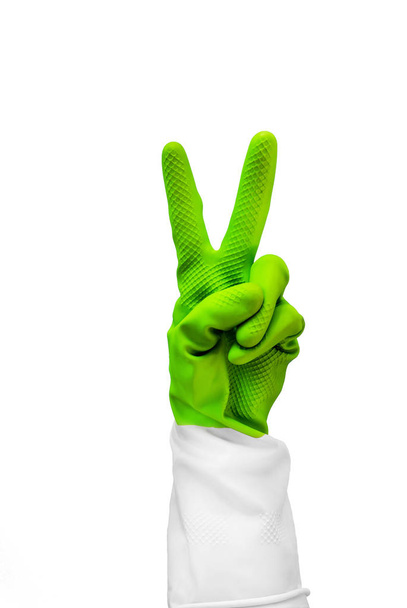 everything is cool sign made of green gloves. Fingers two fingers rabbit symbol. Healthy lifestyle, vitamin , vaccination, afraid of injections, medical , pharmacy, useful habits, proper nutrition - Photo, Image