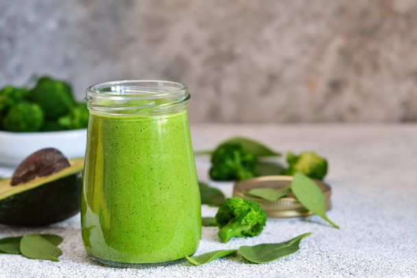 Green smoothie with spinach, avocado and broccoli  - Fotó, kép