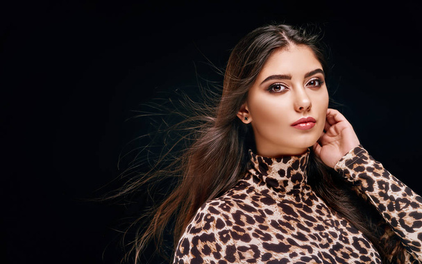 Sensual young brunette in leopard shirt - Valokuva, kuva