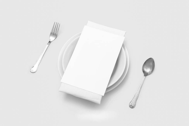 Table place, reserve card, menu mockup on a soft gray background.Plate with menu.spoon and fork. - Photo, Image