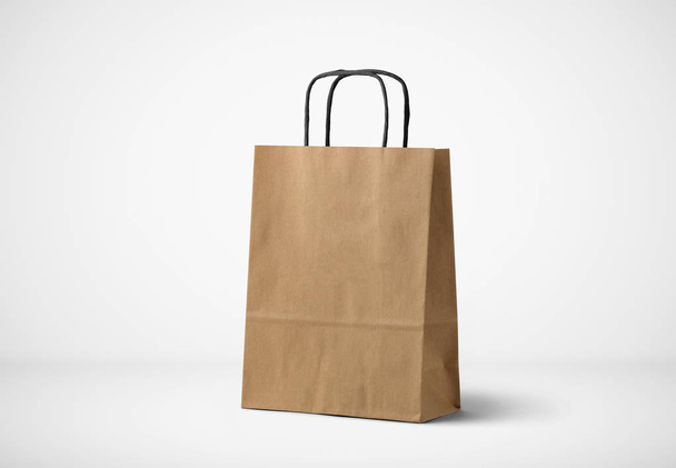 Craft Paper Bag with handles on soft gray background.High resolution photo. - Photo, Image