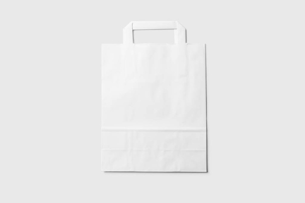 Paper shopping bag Mock-up on soft gray background.an be used for design and branding - Photo, Image