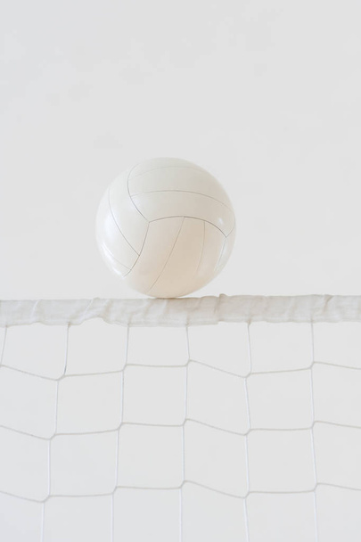 Volleyball ball over the net during match  - Foto, imagen