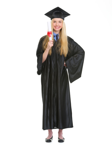 Full length portrait of young woman in graduation gown showing d - Photo, Image