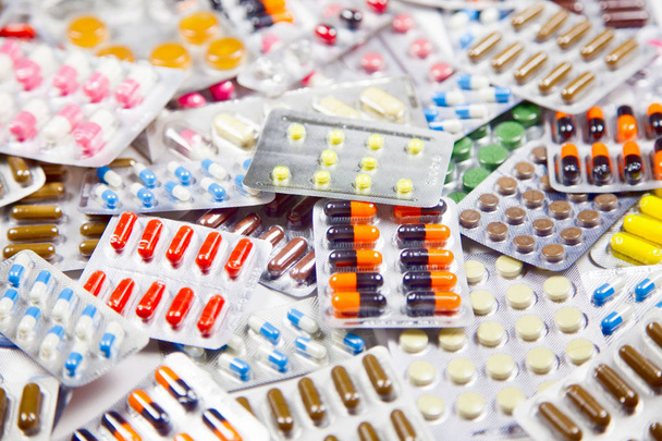 Various medications, medicine and tablets in packages. - Foto, afbeelding