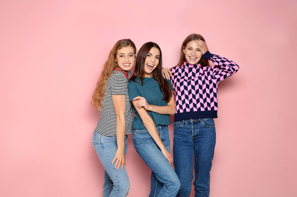 Portrait of young women laughing on color background. Space for text - Foto, afbeelding