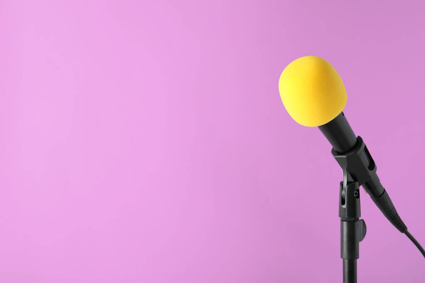 Modern microphone on color background. Space for text - Fotoğraf, Görsel