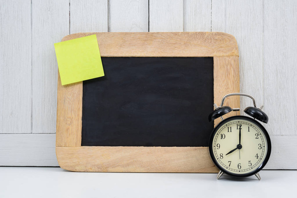 Chalkboard, Alarm clock and blank sticky note, post note or post - Φωτογραφία, εικόνα