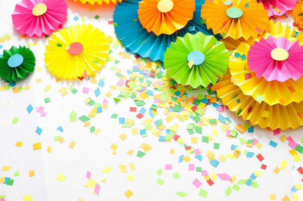 Colorful bright paper rosette. Decorating for a party. - Фото, изображение