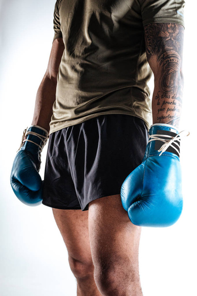 Boxers sportive figure with blue boxing gloves - Φωτογραφία, εικόνα