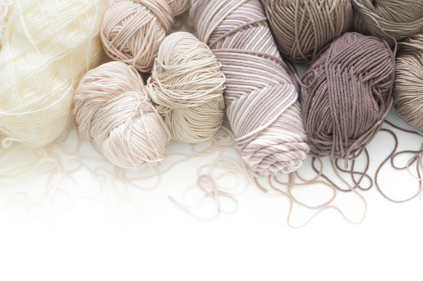 Wool and cotton yarn for knitting of neutral natural color. Back - Φωτογραφία, εικόνα