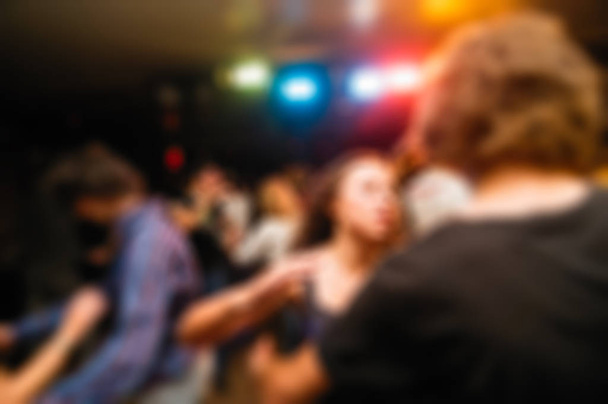 People dancing blur background - Foto, Imagen