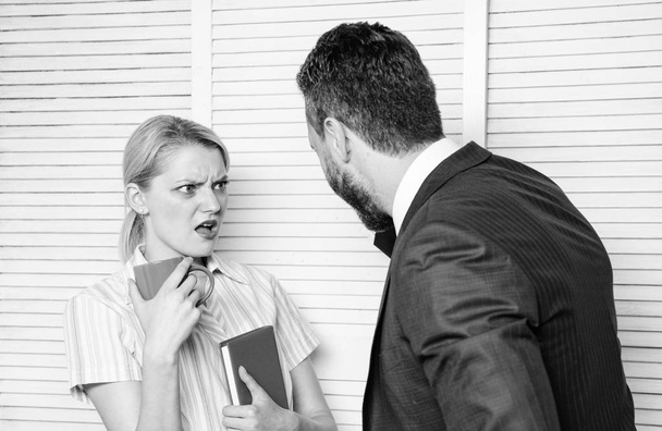 Boss and worker discuss working plan. Prejudice and personal attitude to employee. Office quarrel concept. Misunderstanding between colleagues. Tense conversation or quarrel between colleagues - Photo, image