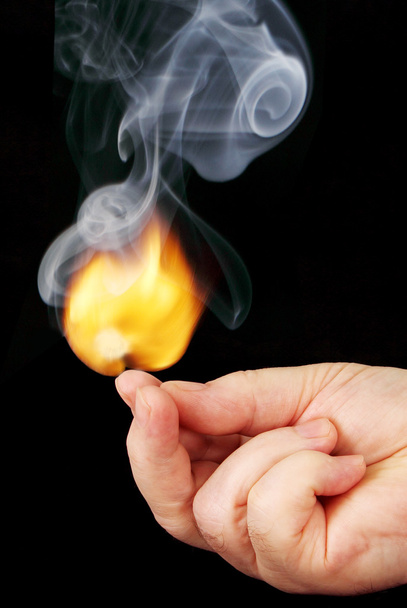 light the flame at the tip of your fingers. - Photo, image