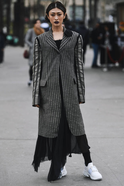 Paris, France - February 28, 2019: Street style outfit after a f - Foto, Bild