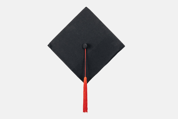 Black academic cap with red tassel isolated on white - Φωτογραφία, εικόνα