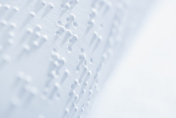 selective focus of braille text on white paper with copy space - Photo, Image