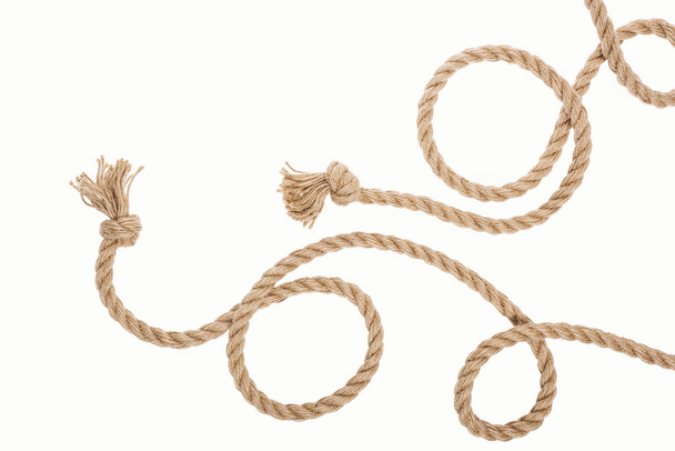 jute curled ropes with knots isolated on white  - Zdjęcie, obraz