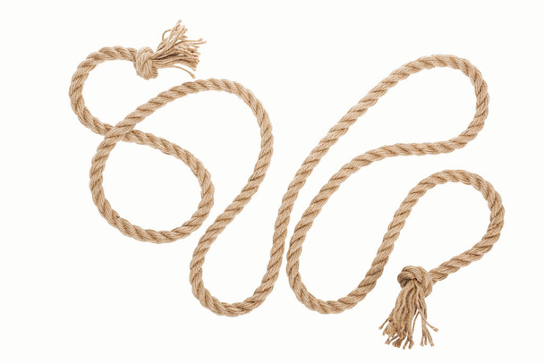 long jute rope with curls and knots isolated on white  - Foto, Imagem