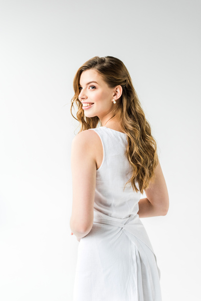 attractive happy girl in dress smiling on white - Photo, Image