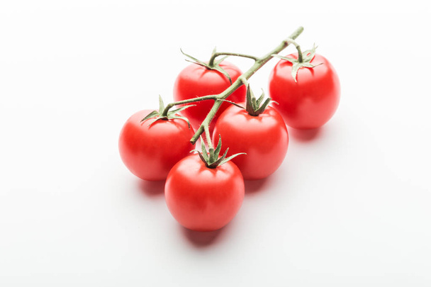 branch of cherry tomatoes on white background - Fotografie, Obrázek