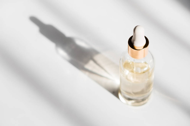 Dropper glass Bottle Mock Up. Cosmetic pipette on white background - Foto, Imagem