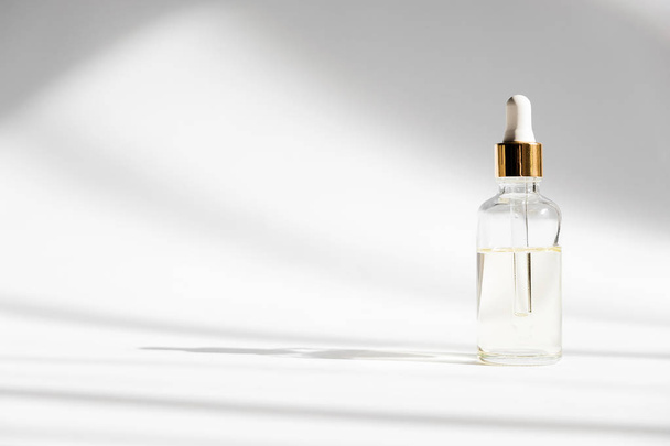 Dropper glass Bottle Mock Up. Cosmetic pipette on white background - Fotoğraf, Görsel